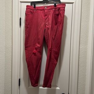 Waxed skinny jean with slashes